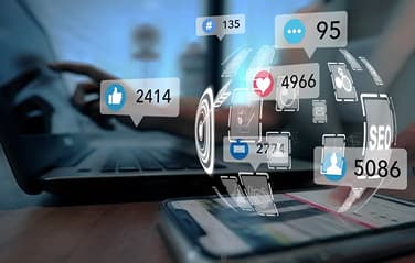 Social media marketing analytics showing engagement likes and followers on digital screen